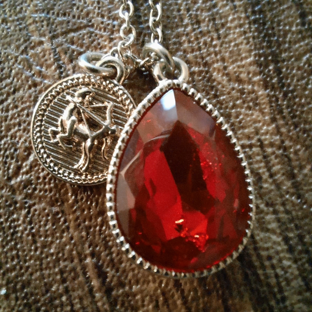 NWT (Avon) double pendant red crystal and charm teardop necklace.